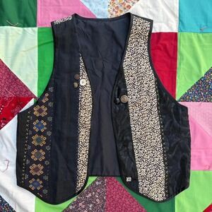 Handmade colorful patchwork vest with button appliqué